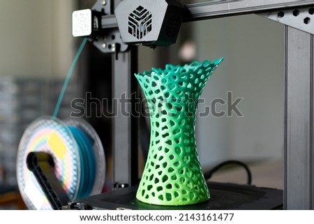 3d printing of a vase with multicolored pla filament Royalty-Free Stock Photo #2143161477