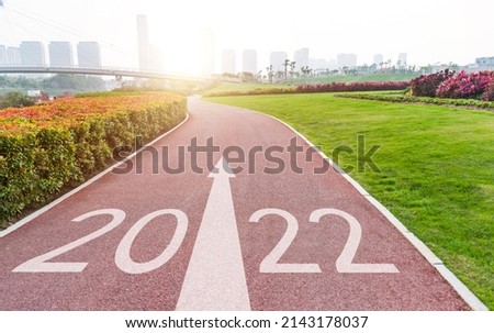Empty asphalt road with number 2022  in the park