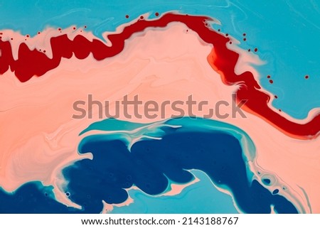Fluid art background with colorful waves and streams. Abstract backdrop with blending and overflowing splatter inks. Liquid and smooth texture with shapes and forms made by mixing paints.