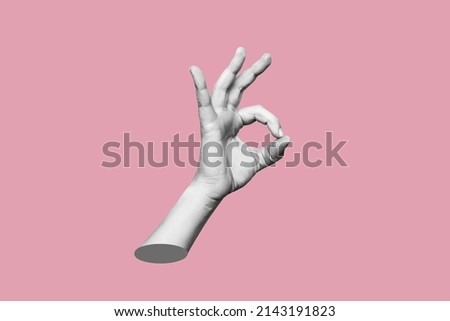 The female hand showing the ok gesture isolated on a pink color background. Trendy abstact 3d collage in magazine urban style. Contemporary art. Modern design. Okey hand sign Royalty-Free Stock Photo #2143191823