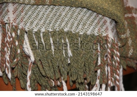 Beige-green woolen plaid with large fringe