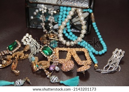 Multicolored decorative jewelry on a dark background