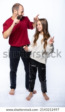father and daughter shout, man and girl, dance, rejoice, have fun. isolated white background