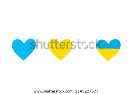 Heart in the colors of the Ukrainian flag. Stop the war concept. Felt heart isolated on white background. Flat lay, a place for text, mockup, template, top view