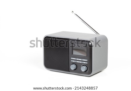 Simple small generic digital and analog home radio receiver device, object isolated on white, cut out. AM FM bands modern radio product, DAB, DAB+, internet radio receiver technology broadcast concept Royalty-Free Stock Photo #2143248857