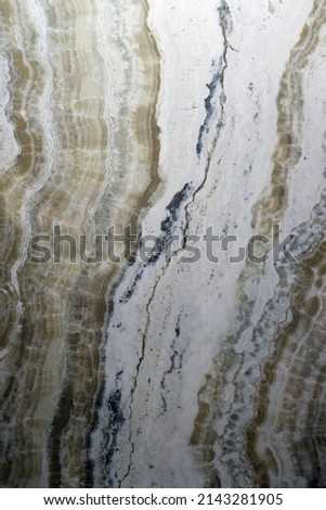 Marble background. Granite texture of natural stone vertical format. Natural natural material for cladding.
