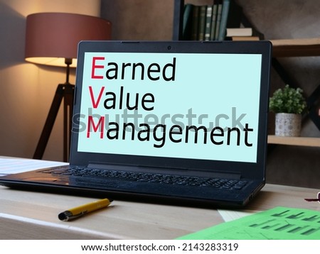 Earned Value Management EVM is shown on a photo using the text