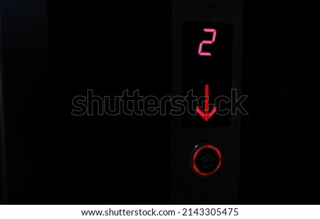 the elevator button is pressed red
