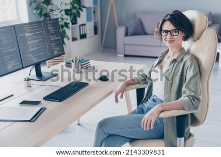 Photo of beautiful it-specialist business lady relaxing in leather chair develop creative website project work in office workstation Royalty-Free Stock Photo #2143309831