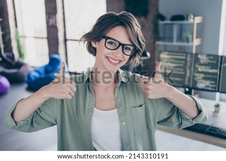 Portrait of smiling server optimization expert two hands show thumb up approve office room indoors Royalty-Free Stock Photo #2143310191