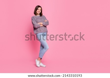 Full length body size view of attractive cheerful girl folded arms isolated over pink pastel color background