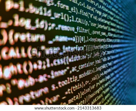 Software developer programming code on computer. Binary code digital technology background. Simple website HTML code with colorful tags in browser view on dark background