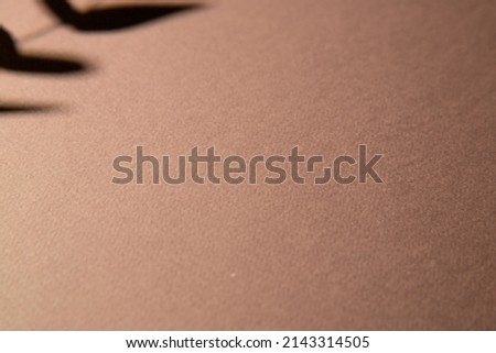 Paper background brown color with hard shadow , architectural drawing. blurred background. abstract shadow background. For design templates, as a canvas for text, advertising.