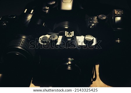 From analog to digital, Group of dslr cameras, evolution and passage of time through technology.