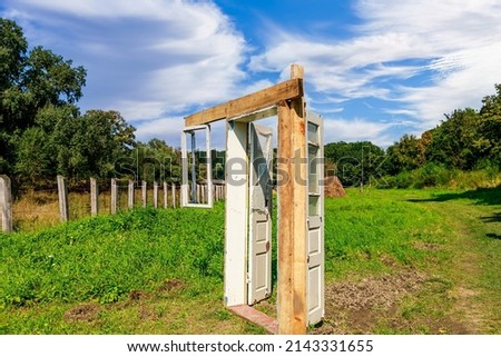 Doors and window from the house as a rustic symbol of hospitality. Background with copy space for text