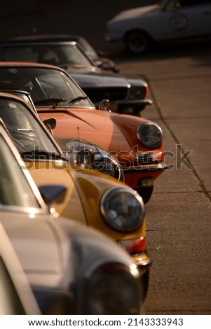 sports collection cars parked with selective focus, vintage cars in different colors. all german cars Royalty-Free Stock Photo #2143333943