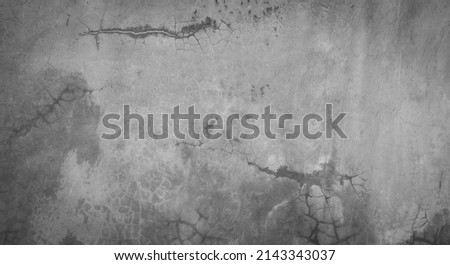 Horizontal dark old cement wall for the background, Texture of a grungy black concrete wall as background for wallpaper decorative design.