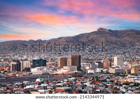 El Paso, Texas, USA  downtown city skyline at dusk with Juarez, Mexico in the distance. Royalty-Free Stock Photo #2143344971