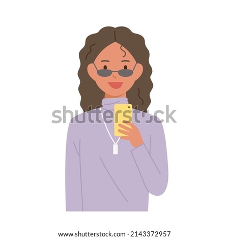A woman with long wavy hair is looking at a smartphone. flat design style vector illustration.