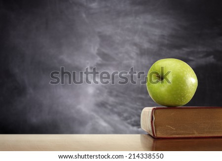 desk apple and book 