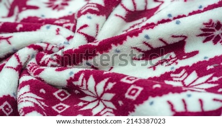 Velvet. Plush. For winter wear. Snow deer, snowflakes. Red and white tones. Silk fabric with soft, smooth and thick pile. Rich Silk Cloth
