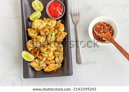 Asian Chicken Appetizer with Condiments Top Down Photo