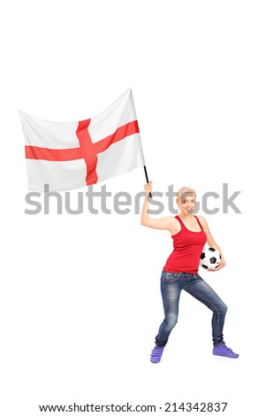 Full length portrait of a female football fan waving an English flag isolated on white background