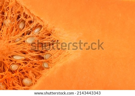 Background with ripe sliced Butternut squash (Cucurbita moschata). High resolution photo. Full depth of field.