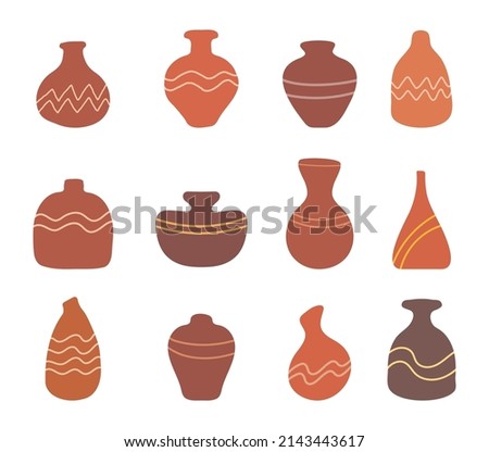 Ancient earthenware bowls or jars For decoration with flowers in a boho style. Royalty-Free Stock Photo #2143443617