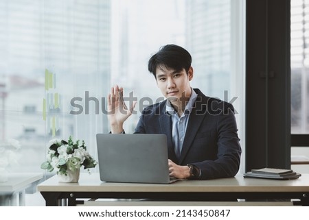 Asian man with suit, young businessman as startup company CEO, executive room, young startup company executives, run by young leaders. Management concept of startup companies and business men.