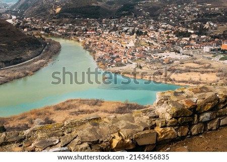Mtskheta, Georgia. Top View Of Ancient Town Located At Valley Of Confluence Of Rivers Mtkvari Kura And Aragvi In Picturesque Highlands. Early Spring Autumn Season. Svetitskhoveli Cathedral Of The Royalty-Free Stock Photo #2143456835