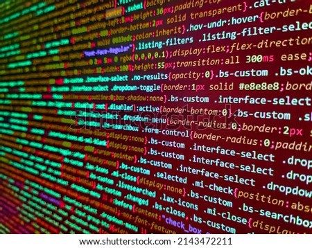Big data concepts working in cyberspace environment. Developing programming binary code. Programmer workplace. Creative Js HTML5 closeup set on background