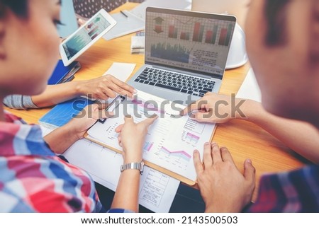 Crop image of business people meeting to discuss the situation on the year plan marketing. Selected focus