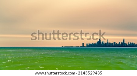 Shot of Lake Michigan and the Chicago skyline with azure hues and a beautiful sky.
