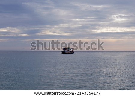 fishing boats at sea in the evening kohkood thailand