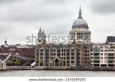 Thames River skyline view with St. Paul's Cathedral in London UK. United Kingdom landmark.