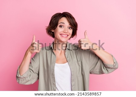Photo of positive attractive lady show thumb up symbol suggest perfect shopping offer isolated over pastel color background