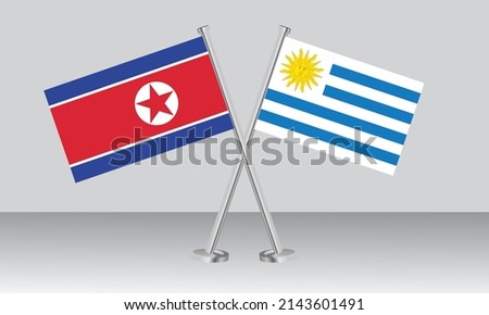 Crossed flags of North Korea and Uruguay. Official colors. Correct proportion. Banner design