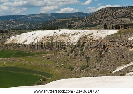 Panoramic view of travertines of Pamukkale (cotton castle) - unique nature wonder in Turkey Royalty-Free Stock Photo #2143614787