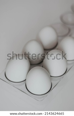 white eggs on a white background. chicken eggs. healthy eating. natural food.