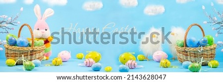 Easter. Happy Easter card with traditional Easter eggs in a basket and a rabbit. Lettering Happy Easter. Chickens. Banner. copy space