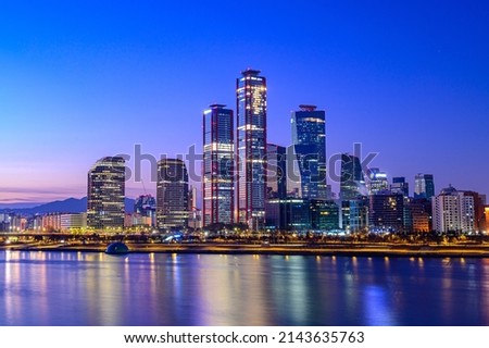Cityscape night view of Yeouido, Seoul at sunset time Royalty-Free Stock Photo #2143635763