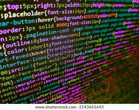 Code of javascript language on white background. Programmer working in a software develop company office. Abstract information digital technology modern background