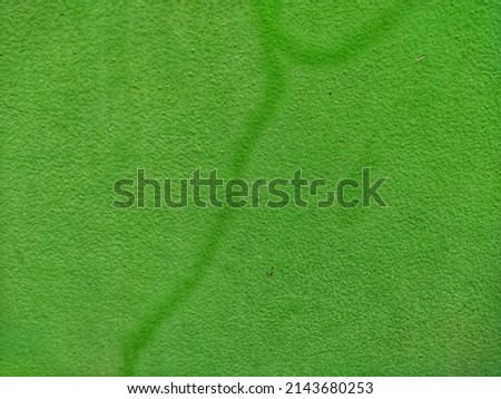 green cement wall background with watermark