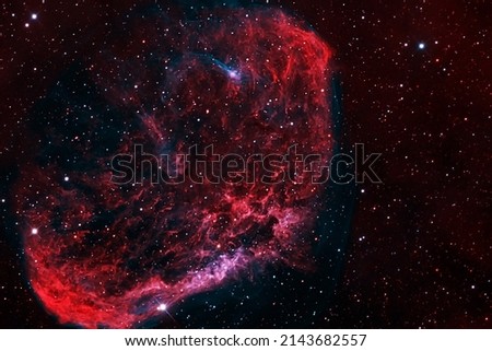 Beautiful galaxy of red color with stars. Elements of this image were furnished by NASA. . High quality photo