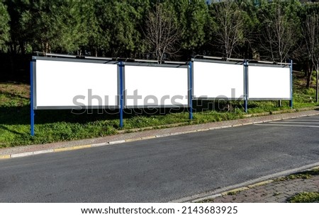 Large blank billboard for outdoor advertising. Four Blank Frame Billboard Mockup.