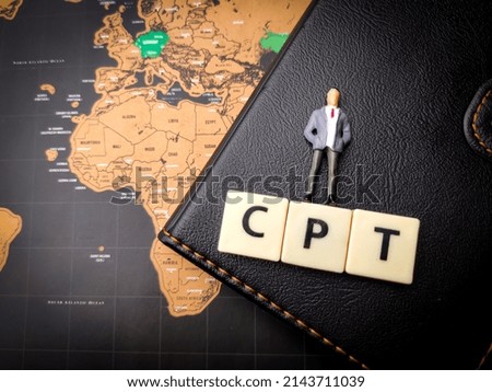 Top view miniature people and toys word with text CPT on a world map background