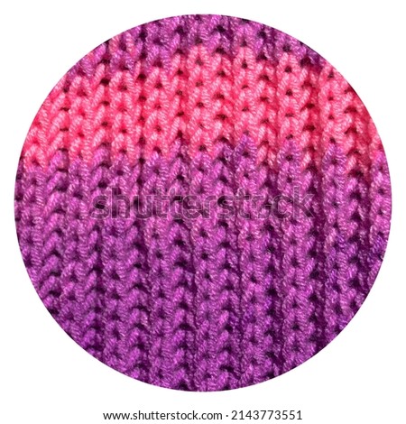 Pattern fabric made of wool. Handmade knitted fabric purple and pink wool background texture