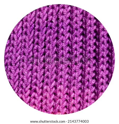 Pattern fabric made of wool. Handmade knitted fabric purple wool background texture