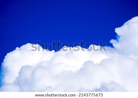 Iridocumulus clouds in the summer sky
